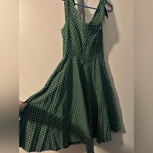 Unique vintage dress with pockets. Green with white polkadots